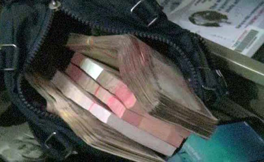 Assets worth over Rs. 60 lakh and cash worth Rs. 7 lakh, hidden under the bed, was found in a raid at the home